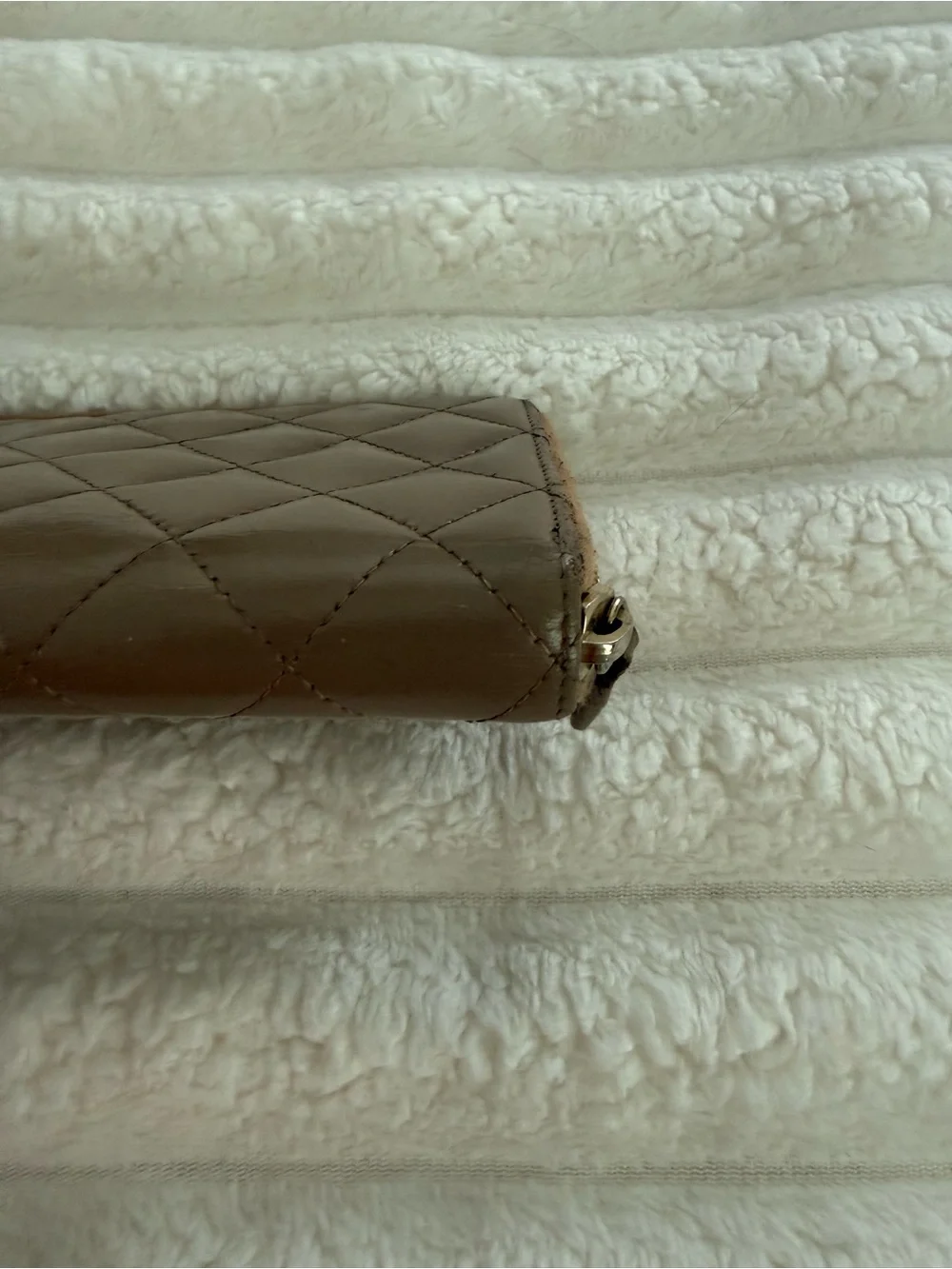 CHANEL Quilted Leather Zip Wallet in Brown with Gold CC